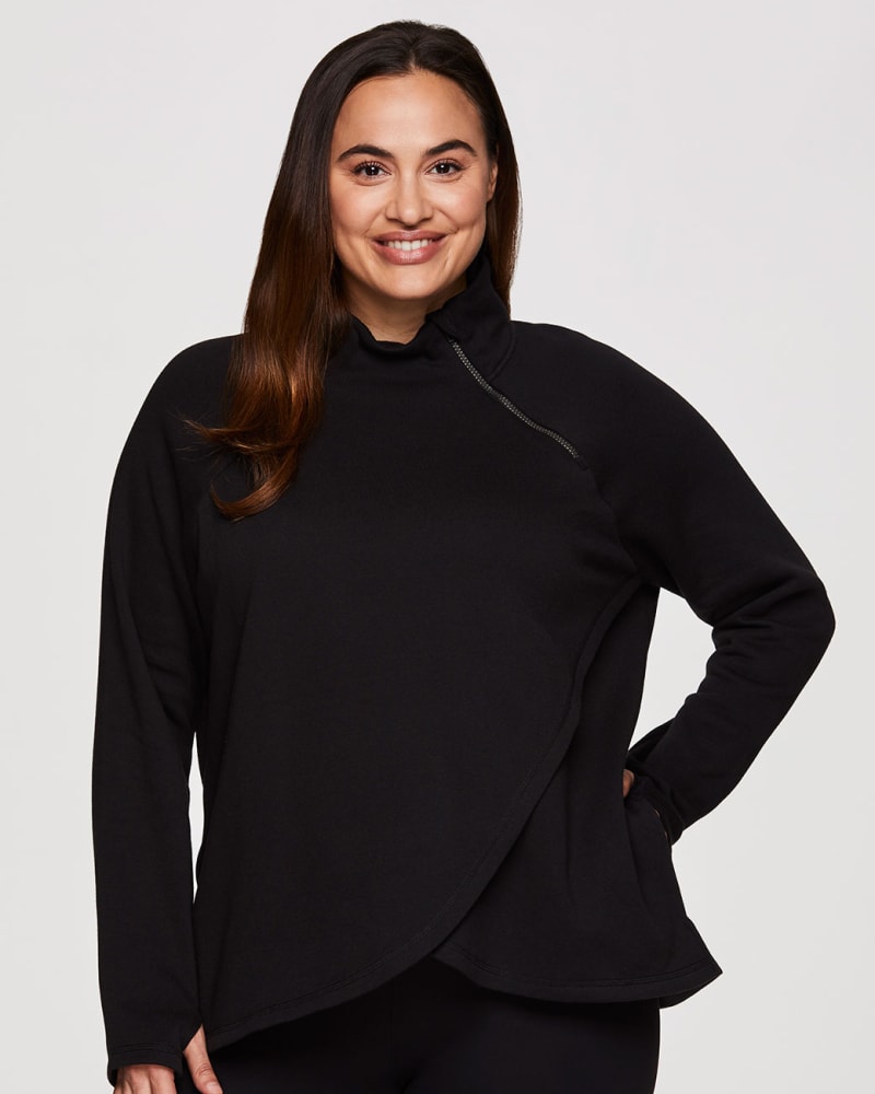 Front of a model wearing a size 1X Plus Prime Ready To Roll Fleece Zip Mock Neck Pullover in Black by RBX Active. | dia_product_style_image_id:316070